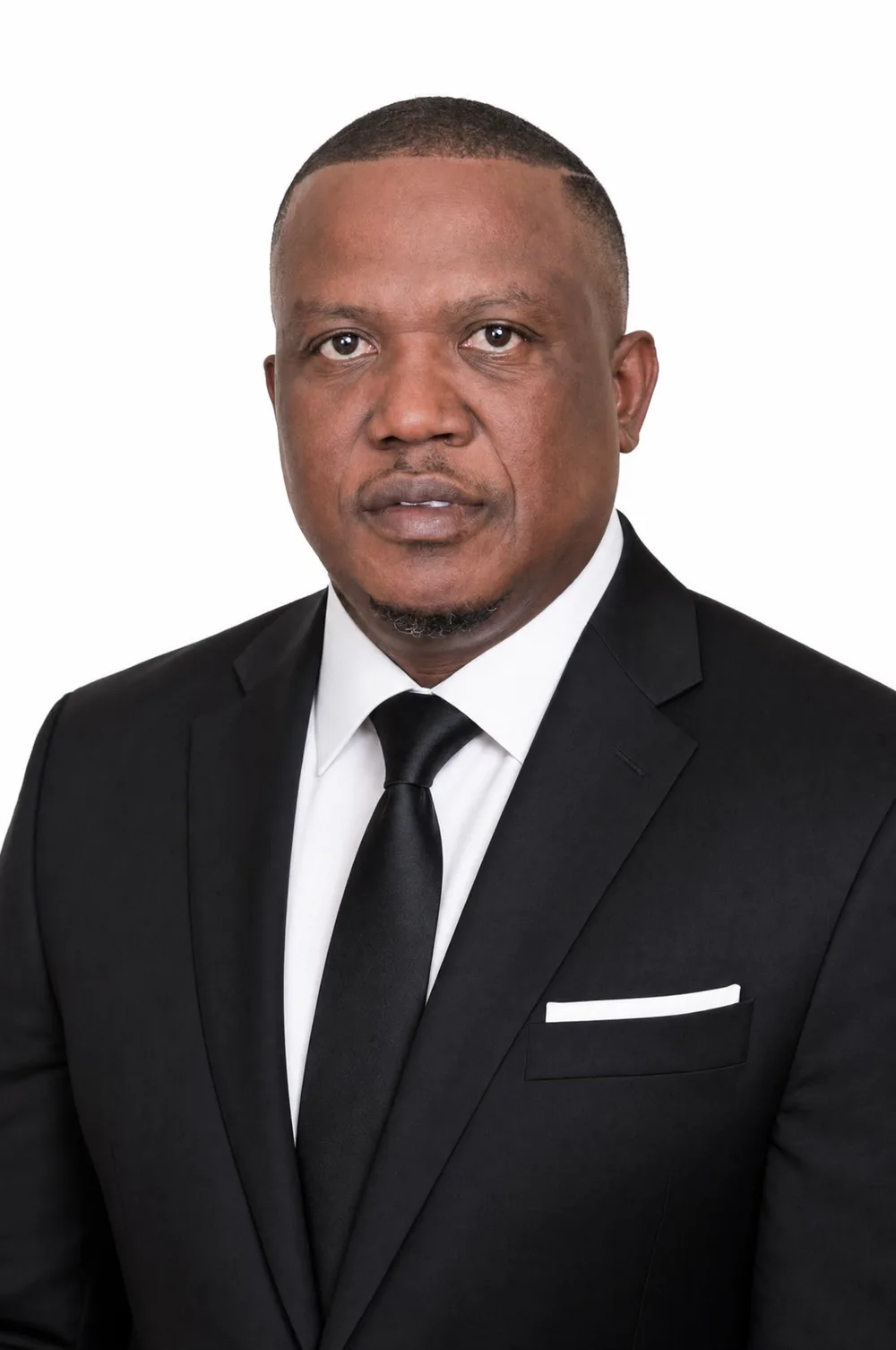 Official headshot of Anthony Nkumbe in a black suit